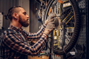 Dude working on a bike